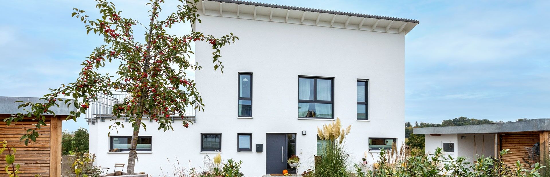 modernes-zweifamilienhaus-mit-pultdach-und-dachterrasse